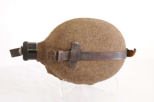 An awesome vintage WWII German/ Czechoslovakian aluminium water canteen with a felt covering