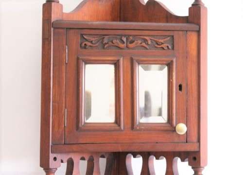 A stunning antique solid oak bathroom corner vanity cabinet w/ bevelled mirrors and carved detailing