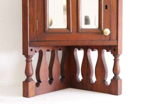 A stunning antique solid oak bathroom corner vanity cabinet w/ bevelled mirrors and carved detailing