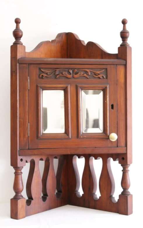 A stunning antique solid oak bathroom corner vanity cabinet w/ bevelled mirrors and carved detailing