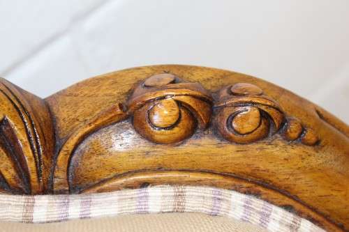 An incredible antique Victorian solid hand carved Mahogany upholstered Chaise Lounge on castors