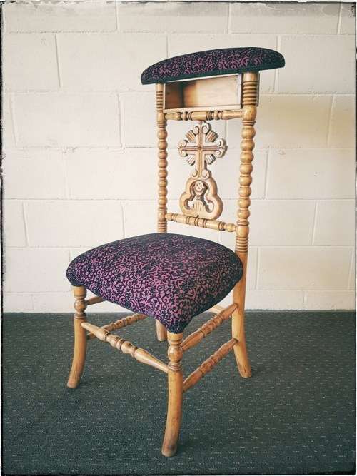 A rare antique hand-carved Oregon "Prie Dieu" prayer chair upholstered in a fabulous brocade fabric