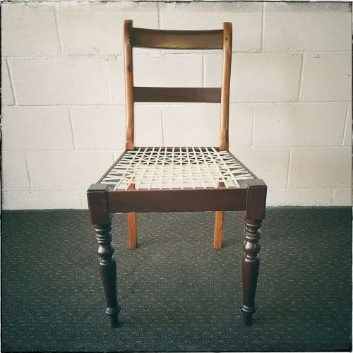 **RS17** Beautifully made solid imbuia riempie chair w/ white leather riempies & turned front legs