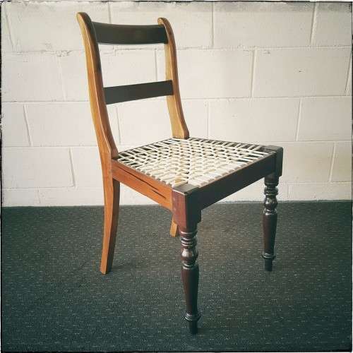 **RS17** Beautifully made solid imbuia riempie chair w/ white leather riempies & turned front legs