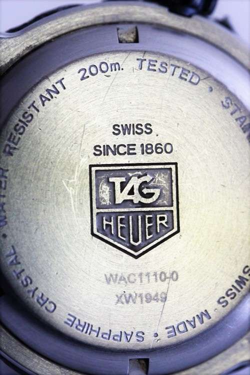 **RS17** A Tag Heuer Formula 1 professional watch w/ dramatic black dial and high quality strap!!