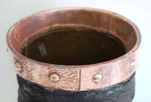 An antique (c1800's) authentic taxidermy Elephant foot umbrella stand w/ copper lining and cuff