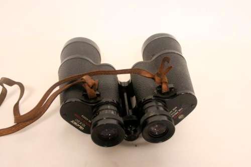 An awesome pair of Japanese made vintage Glory binoculars in their original case.
