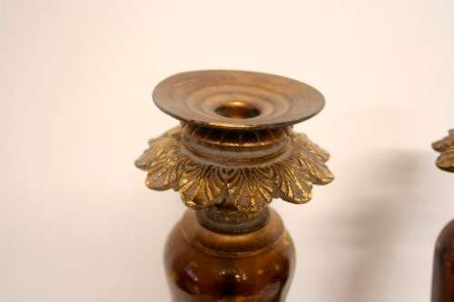 A pair of tall ornate vintage "Baroque" styled moulded resin and glass candle stick holders