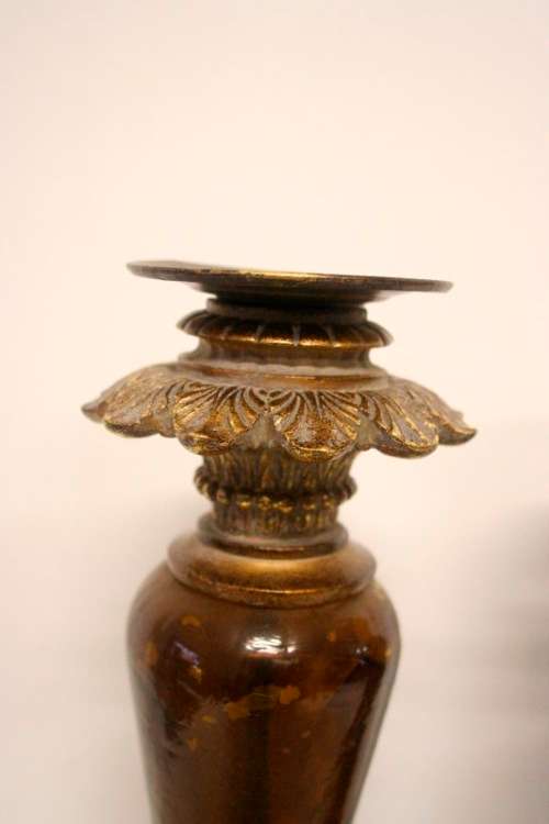 A pair of tall ornate vintage "Baroque" styled moulded resin and glass candle stick holders
