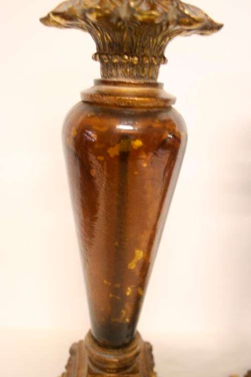 A pair of tall ornate vintage "Baroque" styled moulded resin and glass candle stick holders