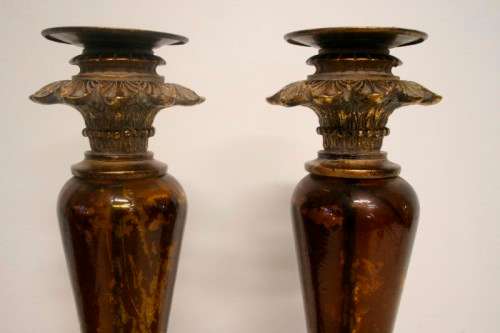 A pair of tall ornate vintage "Baroque" styled moulded resin and glass candle stick holders