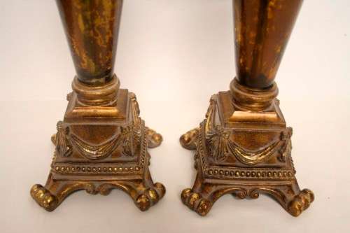 A pair of tall ornate vintage "Baroque" styled moulded resin and glass candle stick holders