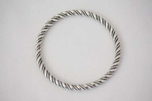 An incredible and beautifully made pure silver (999) ladies twirled bracelet in awesome condition