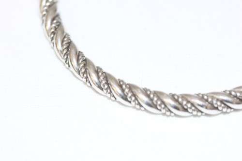 An incredible and beautifully made pure silver (999) ladies twirled bracelet in awesome condition