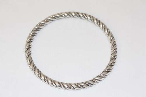 An incredible and beautifully made pure silver (999) ladies twirled bracelet in awesome condition