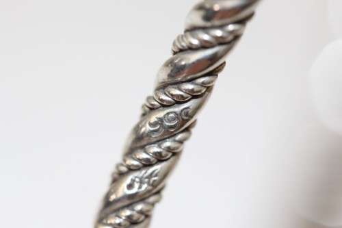 An incredible and beautifully made pure silver (999) ladies twirled bracelet in awesome condition