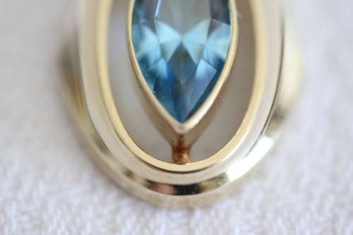 A fantastic mid-century 1950's "K&L" 9ct gold pendant w/ aquamarine center stone, made in Germany