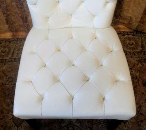 Six stunning white faux leather high-back diningroom chairs, stylish and comfortable. Price/chair