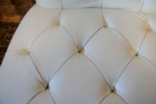 Six stunning white faux leather high-back diningroom chairs, stylish and comfortable. Price/chair