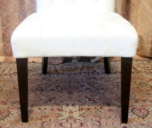 Six stunning white faux leather high-back diningroom chairs, stylish and comfortable. Price/chair