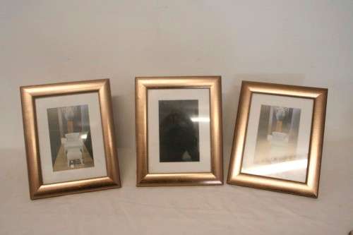 **RS17** Three lovely medium sized bronze coloured free standing photo frames with glass.