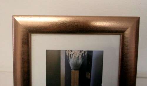 **RS17** Three lovely medium sized bronze coloured free standing photo frames with glass.