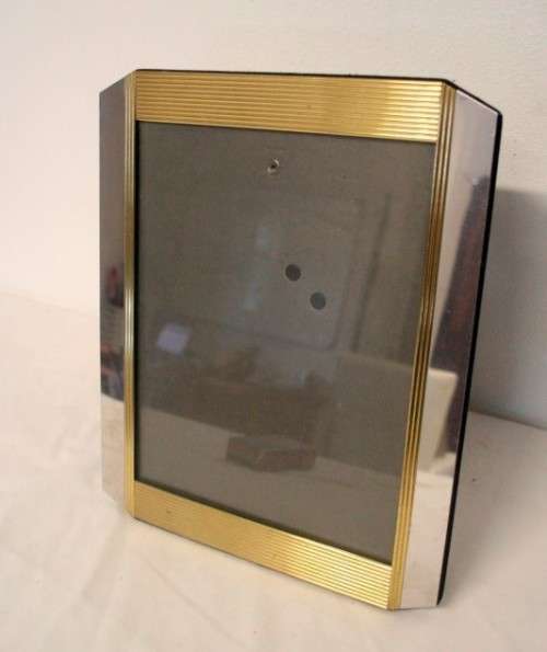 **RS17** A stunning medium sized silver and gold coloured free standing photo frame with glass.
