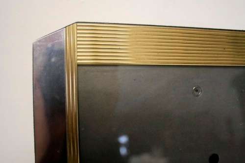 **RS17** A stunning medium sized silver and gold coloured free standing photo frame with glass.