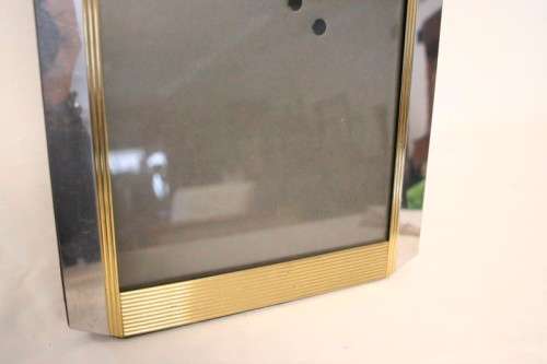 **RS17** A stunning medium sized silver and gold coloured free standing photo frame with glass.