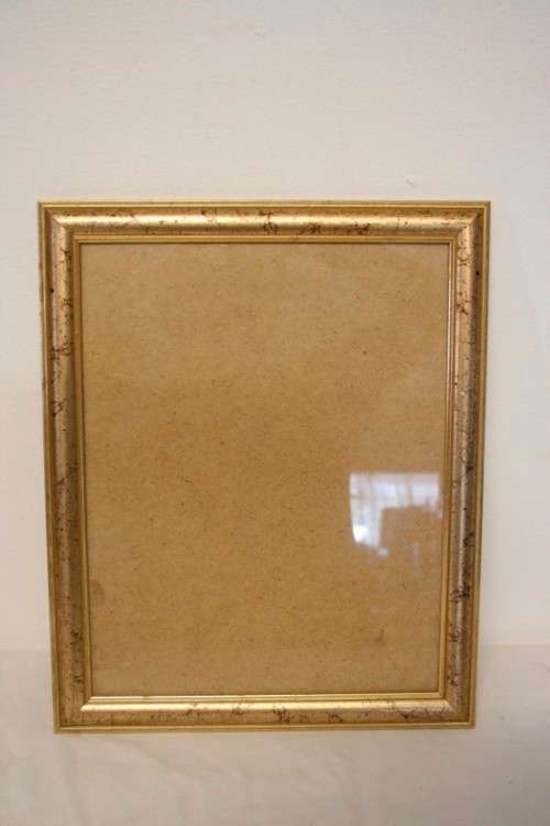 A stunning gold coloured wooden wall mounted photo frame with glass, can hang both ways