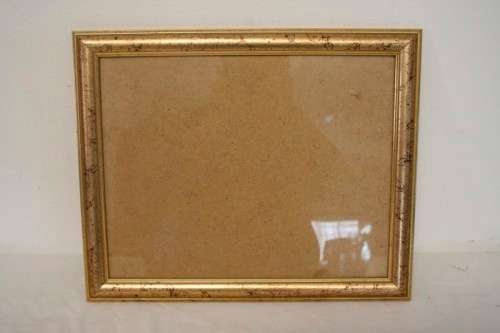 A stunning gold coloured wooden wall mounted photo frame with glass, can hang both ways