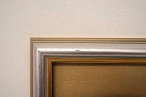 **RS17** A stunning silver and gold coloured wooden wall mounted photo frame with glass.