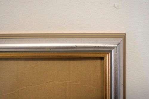 **RS17** A stunning silver and gold coloured wooden wall mounted photo frame with glass.