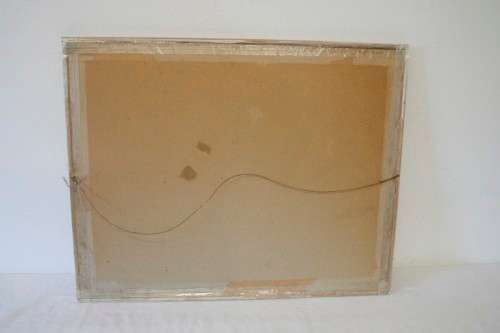 **RS17** A beautiful signed "Ted Hoefsloot" print framed behind glass of a scene of houses.