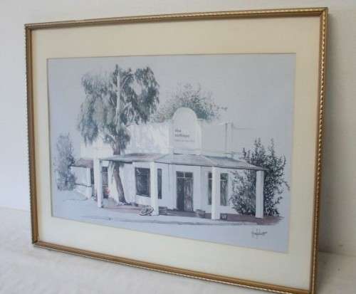 **RS17** A beautiful signed "Ted Hoefsloot" print framed behind glass of The cottage..