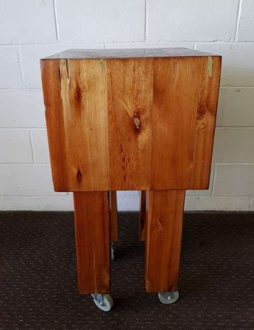 An incredible and solidly made vintage solid wooden mobile butchers chopping block on castors - wow!