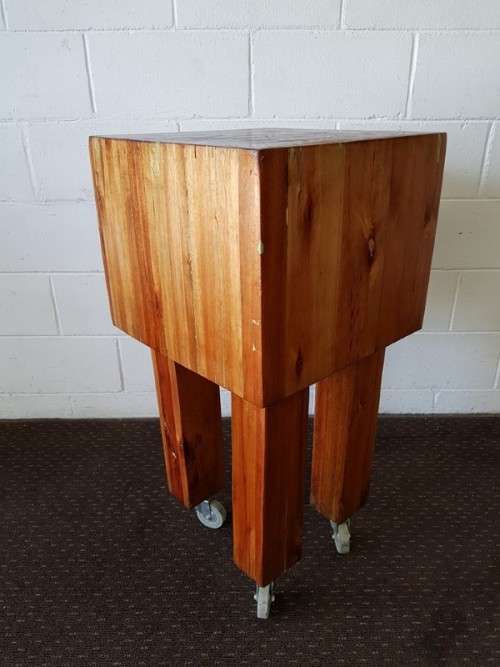 An incredible and solidly made vintage solid wooden mobile butchers chopping block on castors - wow!