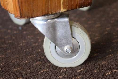 An incredible and solidly made vintage solid wooden mobile butchers chopping block on castors - wow!