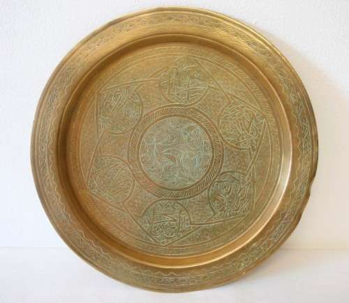 A fabulous vintage/ antique? solid brass engraved serving plate - possibly a pass-over plate