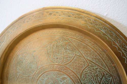A fabulous vintage/ antique? solid brass engraved serving plate - possibly a pass-over plate