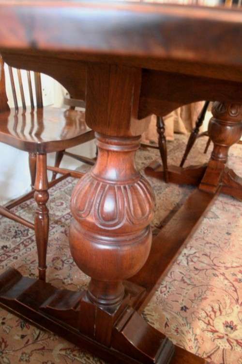 **RS17_Clearance** A solid Oak 6-seater dining room table with six Brace-back Windsor chairs