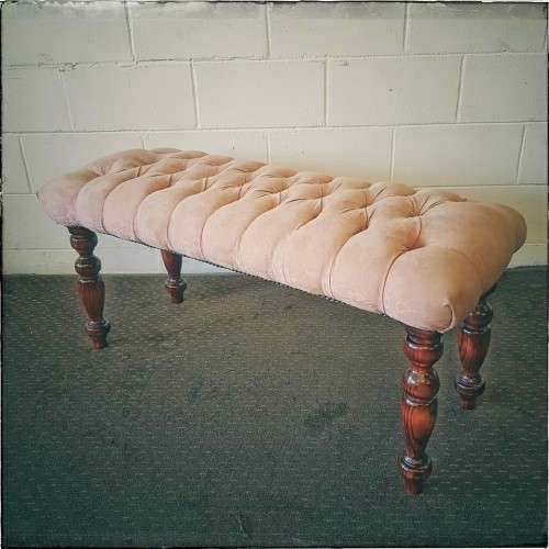 A beautiful vintage Victorian-styled deep-button "bed end" bench upholstered in a dusty pink fabric!