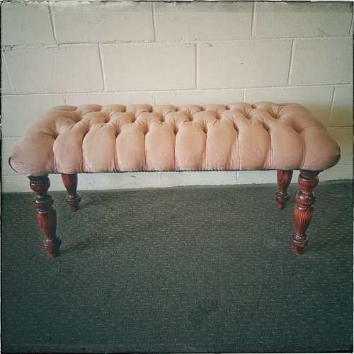 A beautiful vintage Victorian-styled deep-button "bed end" bench upholstered in a dusty pink fabric!