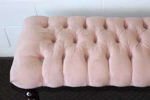 A beautiful vintage Victorian-styled deep-button "bed end" bench upholstered in a dusty pink fabric!