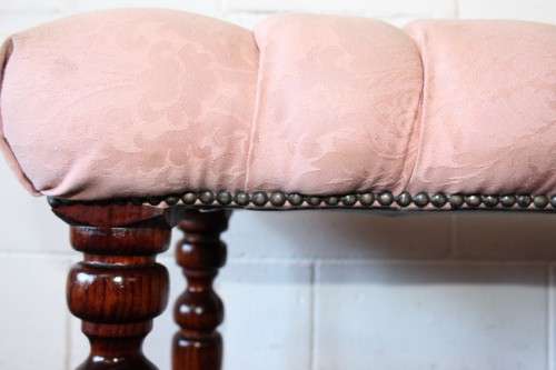 A beautiful vintage Victorian-styled deep-button "bed end" bench upholstered in a dusty pink fabric!