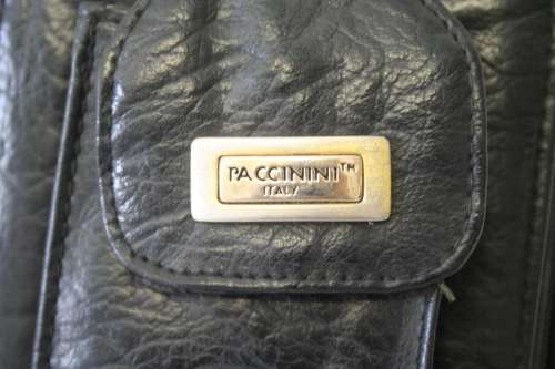 A beautiful Italian made "Paccinini" genuine leather ladies travel purse/bag.