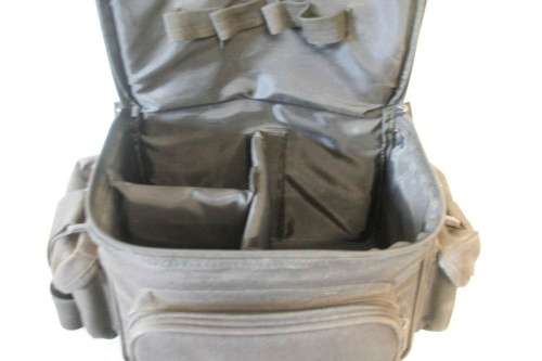 **RS17** A Pentax P30T with a Tokina Sunny 52mm lens and GX20 flash in a camera bag