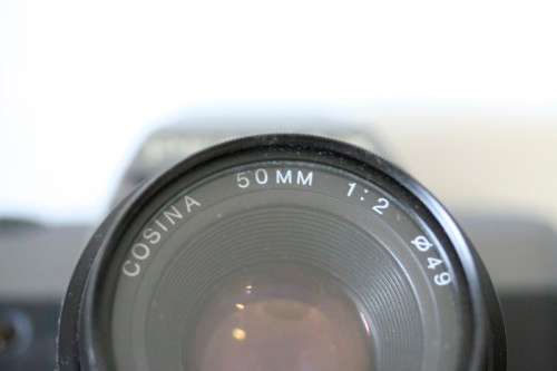 **RS17** A Pentax P30T with a Tokina Sunny 52mm lens and GX20 flash in a camera bag