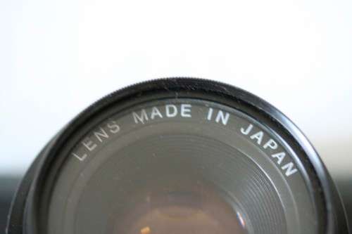 **RS17** A Pentax P30T with a Tokina Sunny 52mm lens and GX20 flash in a camera bag