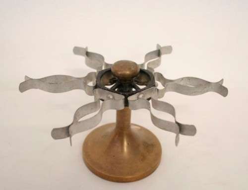 **RS17** A vintage mid century standard metal and brass six rubber stamp holder display carousel